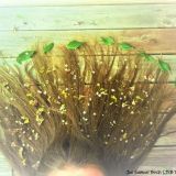 Leaves and petals from daisies on my sister’s friend’s hair; it represents nature. Photo: Joe, aged 15.