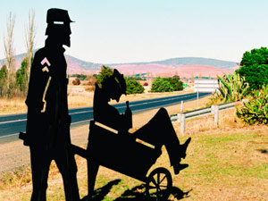 Policeman and wheelbarrow